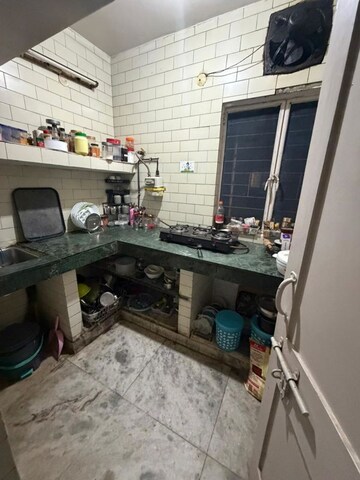 Kitchen in 2 BHK Apartment at Arun Vihar Sector 37, Sector 37 – for Rent