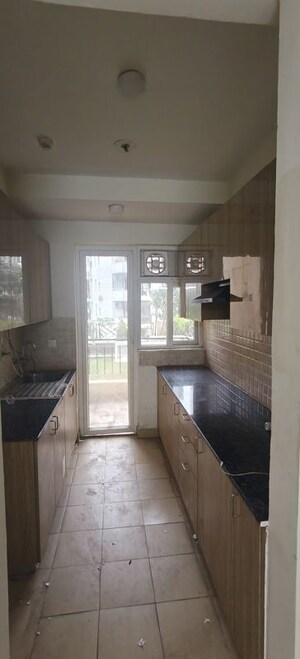 Kitchen in 3 BHK Apartment at Amrapali Crystal Homes, Sector 76 – for Rent