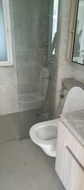Bathroom in 3.5 BHK Apartment at DLF Gardencity Enclave, Sector 93 – for Sale