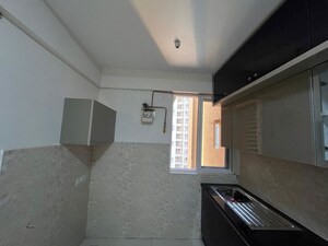 Kitchen in 2 BHK Apartment at Salarpuria Sattva Exotic, Kogilu – for Rent