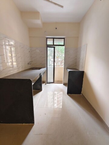 Kitchen in 1 BHK Apartment at Pushpanjali Heights, Owale – for Rent