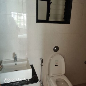 Bathroom in 2.5 BHK Apartment at Kohinoor Viva City, Dhanori – for Sale