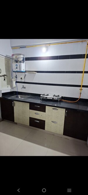 Kitchen in 3 BHK Apartment at Shree Balaji Agora Residency, Sughad – for Rent