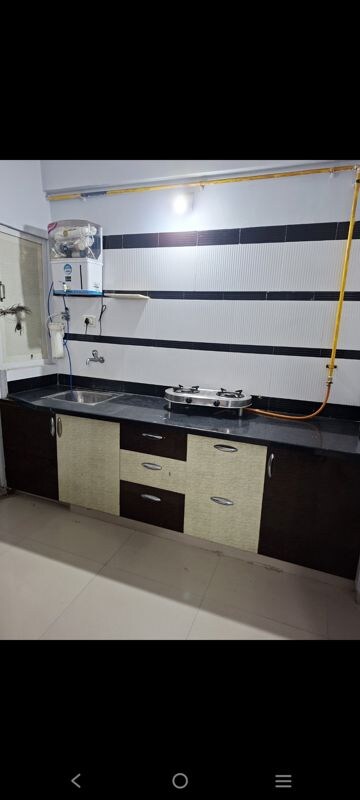 Kitchen in 3 BHK Apartment at Shree Balaji Agora Residency, Sughad – for Rent