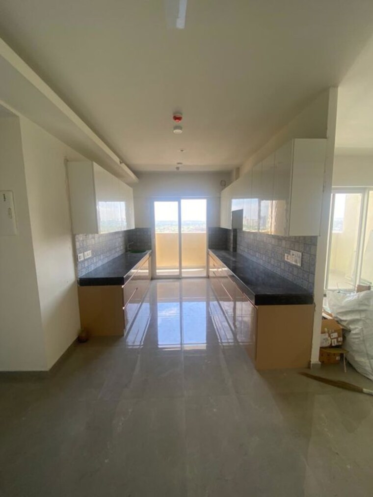 Kitchen, tulip-yellow 3 Bedroom 1704 Sq.Ft. Apartment In Sector 69 Gurgaon 9999255