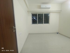 Building Lobby in 1 BHK Apartment at Omkar Signet, Malad East – for Rent