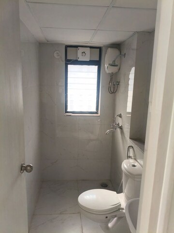 Bathroom in 2 BHK Apartment at Runwal Gardens Phase I, Dombivli East – for Rent
