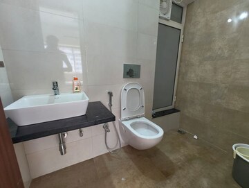 Bathroom in 2 BHK Apartment at Omkar Signet, Malad East – for Rent