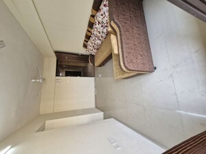 Living Room in 2 BHK Apartment at Rustomjee Avenue L1, Virar West – for Sale