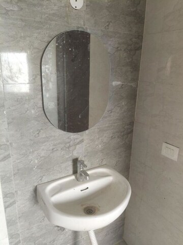 Bathroom in 2.5 BHK Apartment at Amrapali Dream Valley – for Rent