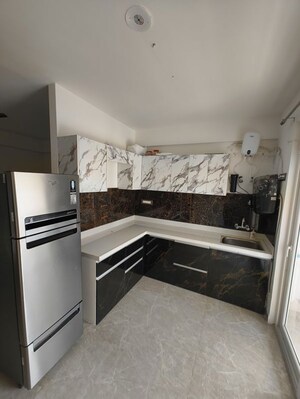 Kitchen in 2 BHK Apartment at Vardhman Empire Estate, Mahapura – for Rent