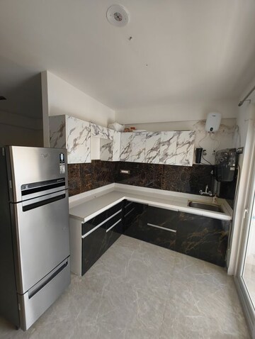 Kitchen in 2 BHK Apartment at Vardhman Empire Estate, Mahapura – for Rent