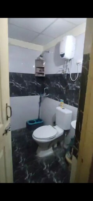 Bathroom in 3 BHK Apartment at Gulmohur Garden, Raj Nagar Extension – for Sale