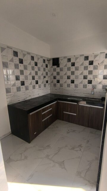 Kitchen in 1 BHK Apartment at Windsor Swapna Sankul, Lohgaon – for Rent