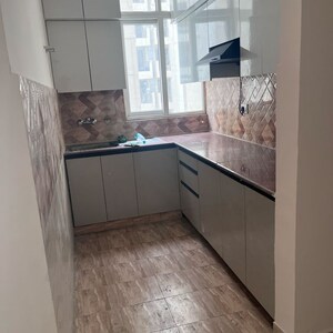 Kitchen in 2 BHK Apartment at Mahagun Mywoods, Sector 16c Greater Noida – for Rent