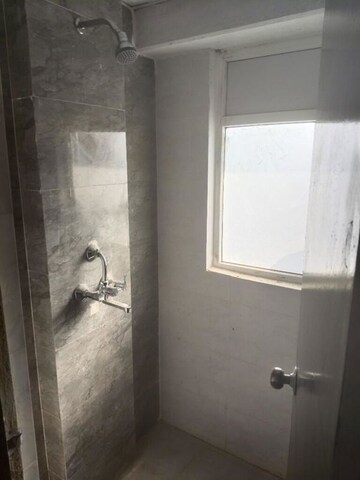 Bathroom in 1 BHK Apartment at Amrapali Dream Valley – for Rent