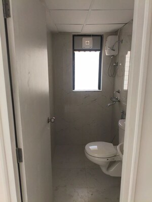 Bathroom in 1 BHK Apartment at Runwal Gardens Phase I, Dombivli East – for Rent