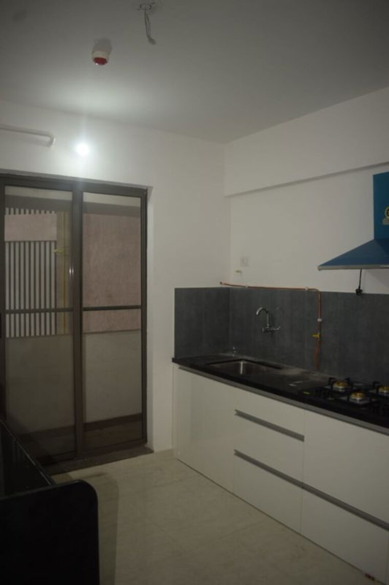 Kitchen, moze-skyways-esfera 2 Bedroom 764 Sq.Ft. Apartment In Lohgaon Pune 10000051