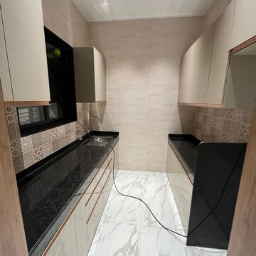 Kitchen in 2 BHK Apartment at The Baya Sunrise, Kohinoor Mill – for Sale