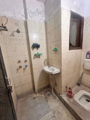 Bathroom in 1.5 BHK Builder Floor at Govindpuri – for Rent