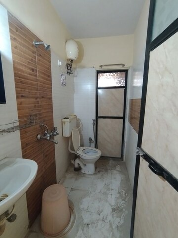 Bathroom in 2 BHK Apartment at Ram Pushpanjali Residency, Owale – for Sale