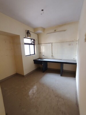 Kitchen in 2 BHK Apartment at Ram Pushpanjali Residency, Owale – for Sale