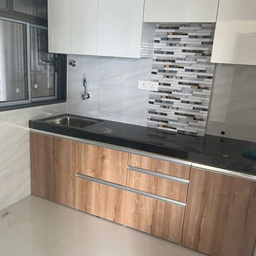 Kitchen in 1 BHK Apartment at Bhoomi Samarth C Wing, Sonawala Industry Estate – for Rent