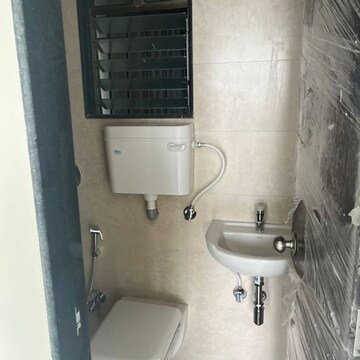 Bathroom in 1 BHK Apartment at Bhoomi Samarth C Wing, Sonawala Industry Estate – for Rent