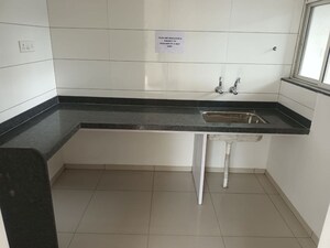 Kitchen in 2 BHK Apartment at Kumar Park Infinia, Fursungi – for Sale