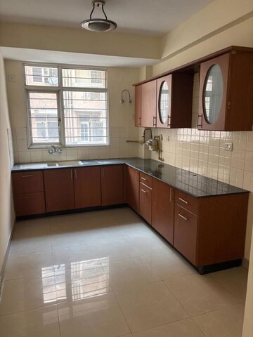 Kitchen in 3 BHK Apartment at Eldeco Mystic Greens, Omicron I Greater Noida – for Rent