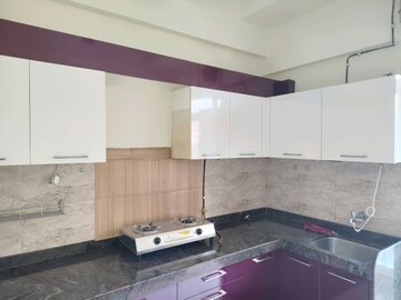 Kitchen in 3 BHK Apartment at Harmony Sky Suites, Ghodbunder Road – for Rent