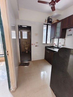 Kitchen in 1 BHK Apartment at Kavya Hill View CHS, Anand Nagar – for Rent