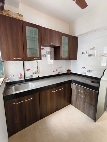 Kitchen in 1 BHK Apartment at Kavya Hill View CHS, Anand Nagar – for Rent