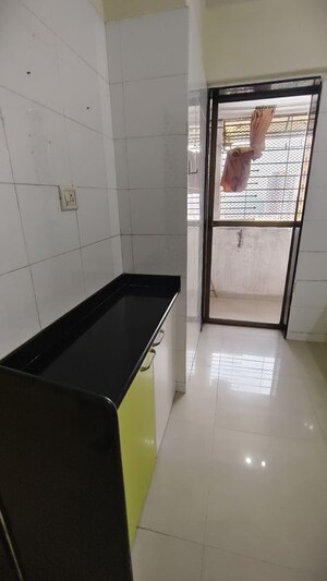 Kitchen in 2 BHK Apartment at Neha Heena Gaurav Jewels, Goregaon East – for Rent