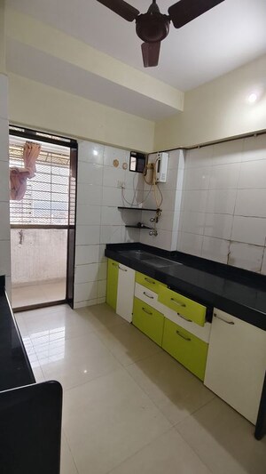 Kitchen in 2 BHK Apartment at Neha Heena Gaurav Jewels, Goregaon East – for Rent
