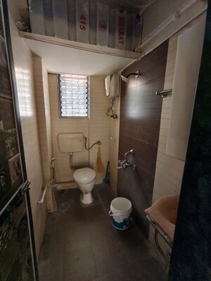 Bathroom in 1 BHK Apartment at Kavya Hill View CHS, Anand Nagar – for Rent