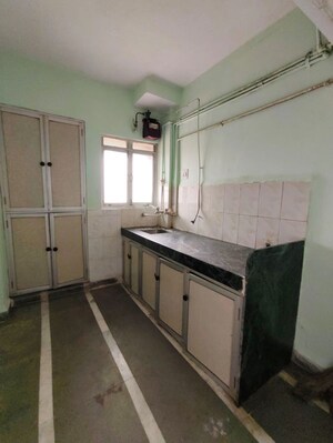 Kitchen in 1 BHK Apartment at Rutu Enclave, Kasarvadavali – for Rent