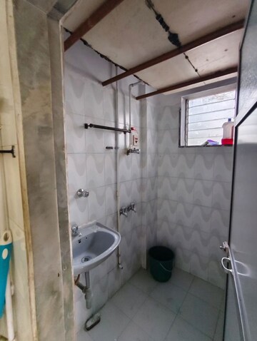 Bathroom in 1 BHK Apartment at Rutu Enclave, Kasarvadavali – for Rent