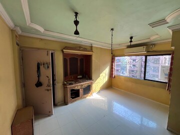 Living Room in 2 BHK Apartment at Yashraj Park CHS, Kasarvadavali – for Rent