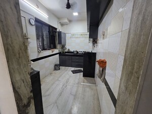 Kitchen in 2 BHK Apartment at Ahimsa Enclave, Malad West – for Rent