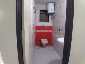 Bathroom in 3 BHK Apartment at Charkop Kshitij CHS, Kandivali West – for Rent