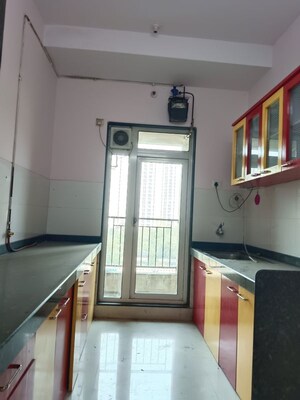 Kitchen in 2 BHK Apartment at Rustomjee Urbania Azziano, Thane West – for Rent