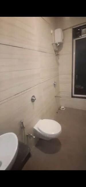 Bathroom in 3 BHK Apartment at Metro Millennium, Malad West – for Rent