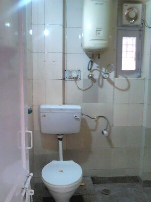 Bathroom in 3 BHK Apartment at Dwarka – for Rent
