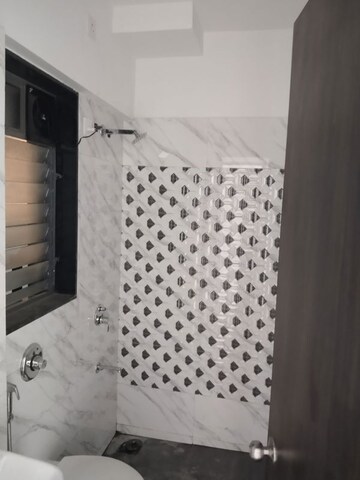 Bathroom in 1 BHK Apartment at UK Iridium, Kandivali East – for Rent