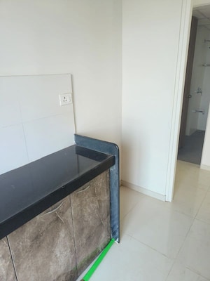 Kitchen in 1.5 BHK Apartment at Godrej Emerald, Ghodbunder Road – for Rent