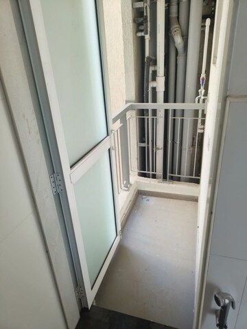 Staircase in 1.5 BHK Apartment at Godrej Emerald, Ghodbunder Road – for Rent