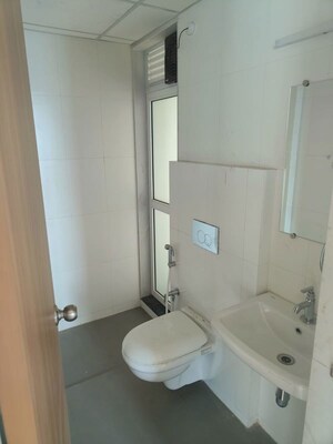Bathroom in 1.5 BHK Apartment at Godrej Emerald, Ghodbunder Road – for Rent
