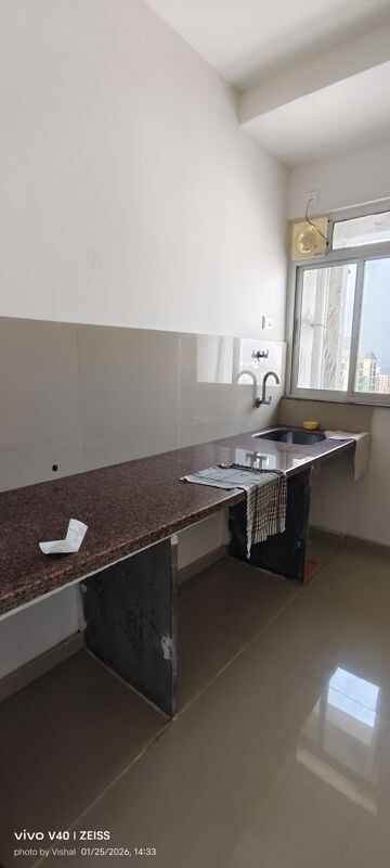 Kitchen in 1 BHK Apartment at Puranik Hometown, Ghodbunder Road – for Rent