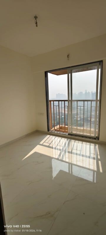 Bedroom in 1 BHK Apartment at Metropolis Bayside, Kasarvadavali – for Rent